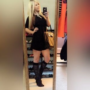 Black soft knit mini dress with 3/4 inch sleeves